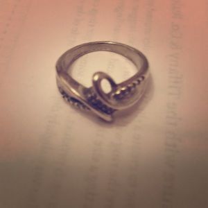 Silver ring with small diamond chips